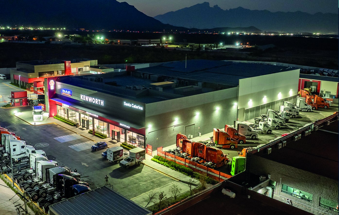 Kenworth dealership at night, aerial view