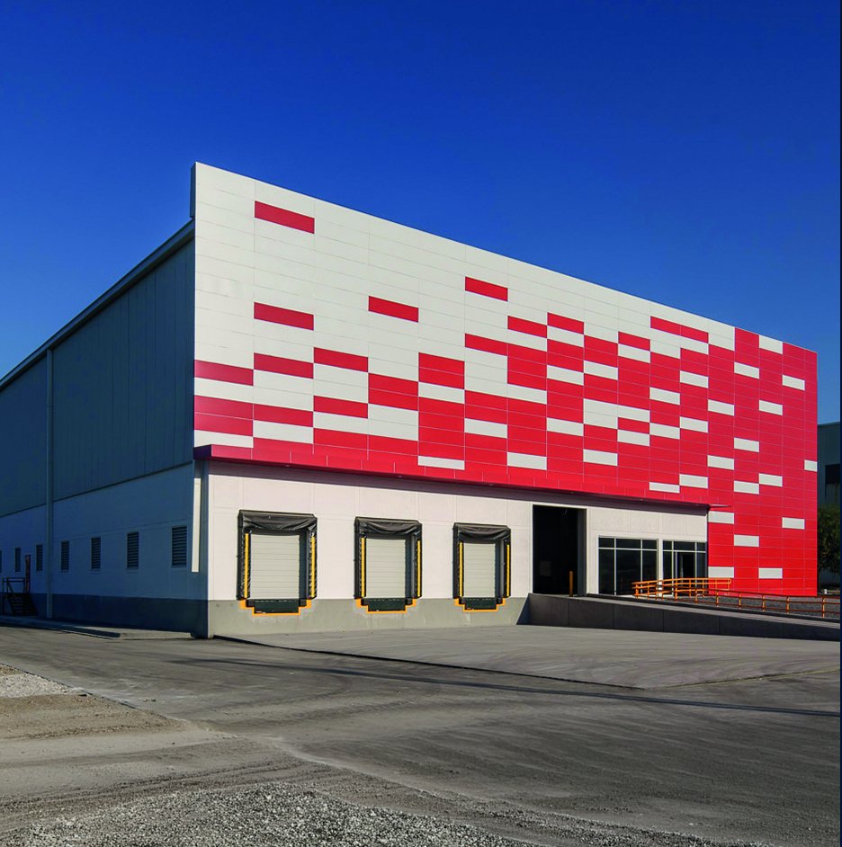 Industrial building with red and white facade